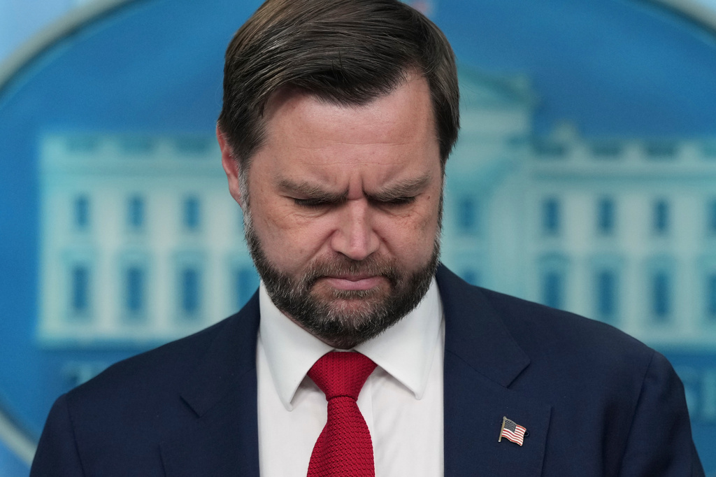 Vice President JD Vance listens as a reporter asks a question in the James Brady Press Briefing Room at the White House, Thursday, June 18, 2026, in Washington. (AP Photo/Jacquelyn Martin)