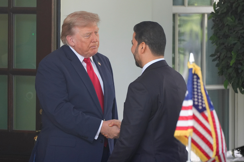 President Donald Trump greets Iraq's Prime Minister Ali al-Zaidi at the White House, Tuesday, July 14, 2026, in Washington.(AP Photo/Alex Brandon)