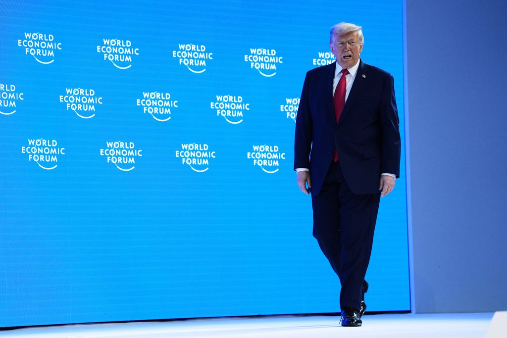 President Donald Trump arrives on stage to address the audience during the Annual Meeting of the World Economic Forum in Davos, Switzerland, Wednesday, Jan. 21, 2026. (AP Photo/Evan Vucci)