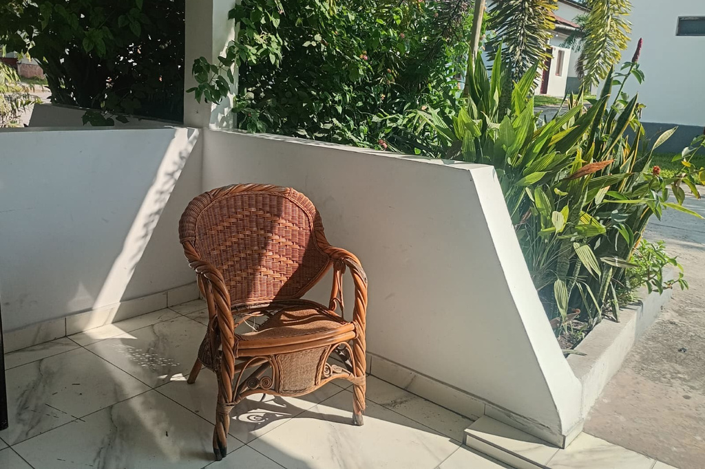 A chair is seen outside a hotel room where a Colombian woman was deported to from the United States, in Kinshasa, Congo, Saturday, May 10, 2026. (UGC via AP)