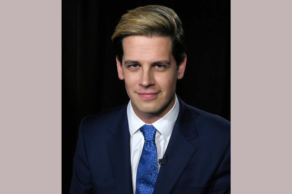 FILE - Media personality and author Milo Yiannopoulos appears during an interview in New York on July 18, 2017, to promote his autobiography, "Dangerous." (AP Photo/John Carucci, File)