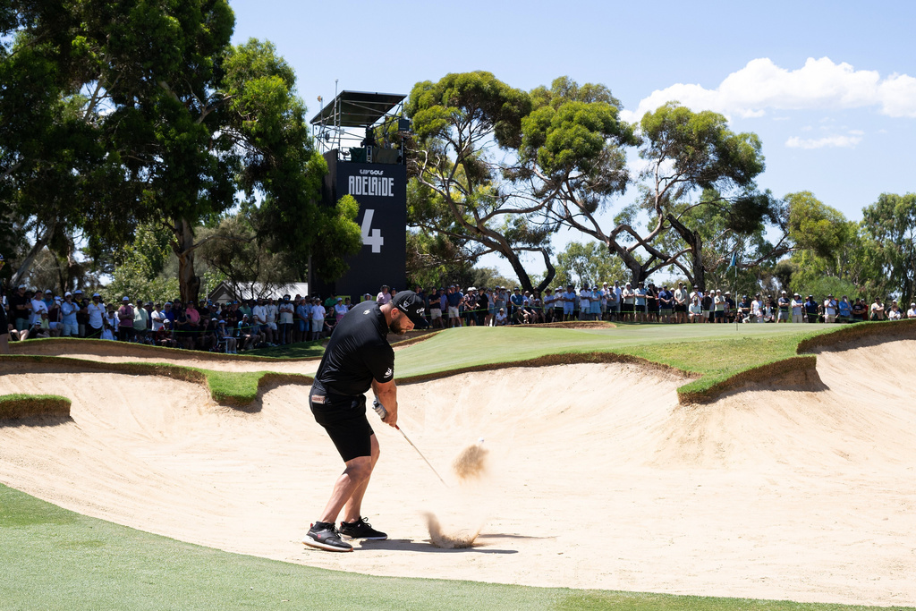 Captain Bryson DeChambeau of Crushers GC hits his shot from a bunker on the fourth hole during the final round of the LIV Golf Adelaide at Grange Golf Club in Adelaide, Australia Sunday, Feb. 15, 2026. (Charles Laberge/LIV Golf via AP)