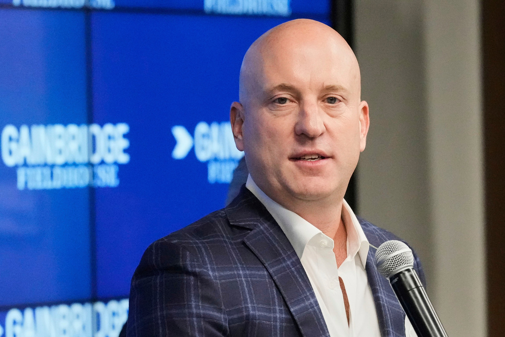 FILE - Group 1001 President & Chief Executive Officer Dan Towriss, also CEO of TWG Motorsports, speaks during a news conference in Indianapolis, Monday, Sept. 27, 2021. (AP Photo/AJ Mast, File)