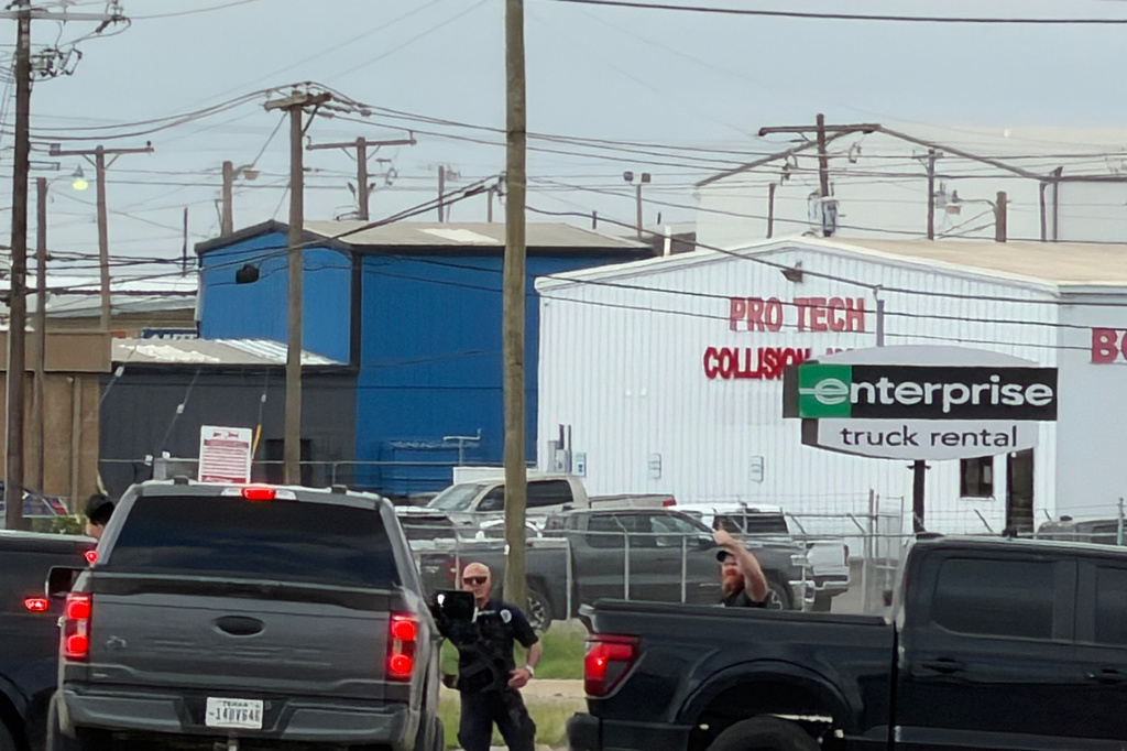 Law enforcement responds to an active shooting scene Friday, June 12, 2026, in Midland, Texas. (Luke Dias/Reporter-Telegram via AP)