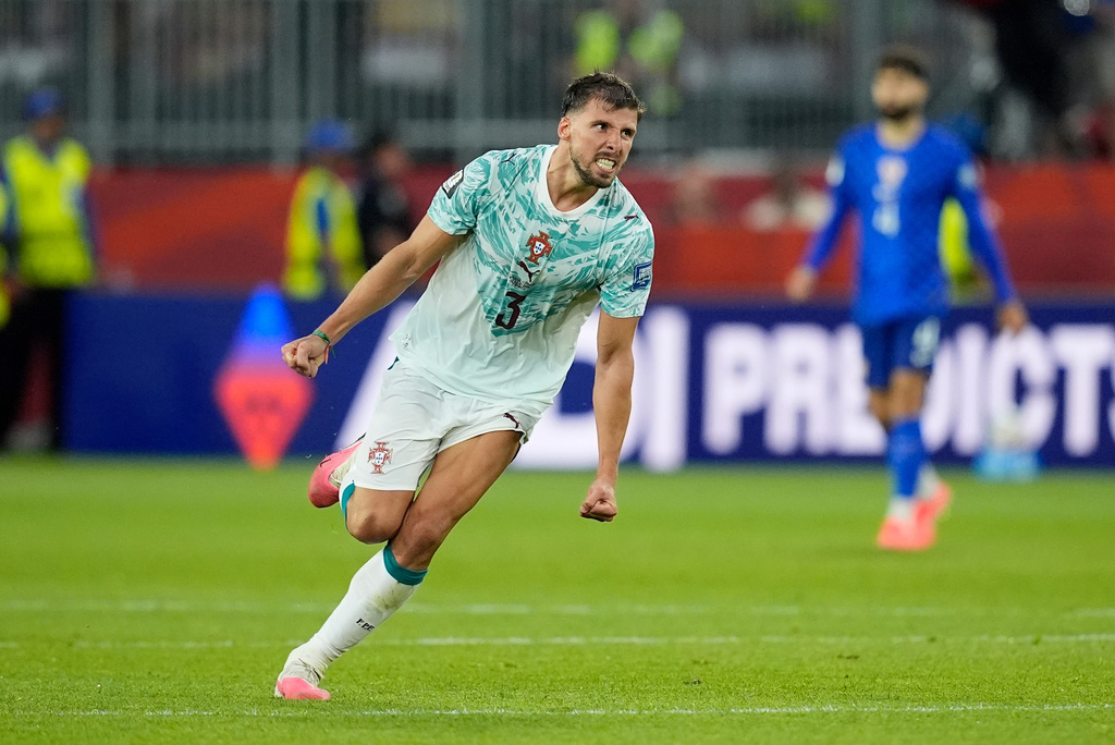 Portugal's Ruben Dias (3) celebrates a win during the World Cup round of 32 soccer match between Portugal and Croatia in Toronto, Thursday, July 2, 2026. (AP Photo/Mike Stewart)