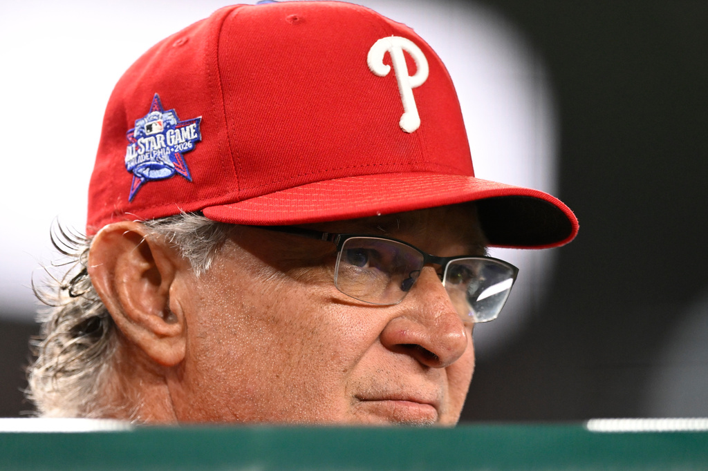 Philadelphia Phillies interim manager Don Mattingly watches the action from the dugout during the fifth inning of a baseball game against the Washington Nationals, Monday, June 22, 2026, in Washington. (AP Photo/John McDonnell)