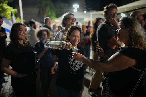 Relatives and supporters of Israeli hostages held by Hamas in the Gaza Strip celebrate after the announcement that Israel and Hamas have agreed to the first phase of a peace plan, as they gather at a plaza known as the hostages square in Tel Aviv, Israel, Thursday, Oct. 9, 2025. (AP Photo/Emilio Morenatti) Relatives and supporters of Israeli hostages held by Hamas in the Gaza Strip celebrate after the announcement that Israel and Hamas have agreed to the first phase of a peace plan, as they gather at a plaza known as the hostages square in Tel Aviv, Israel, Thursday, Oct. 9, 2025. (AP Photo/Emilio Morenatti)
