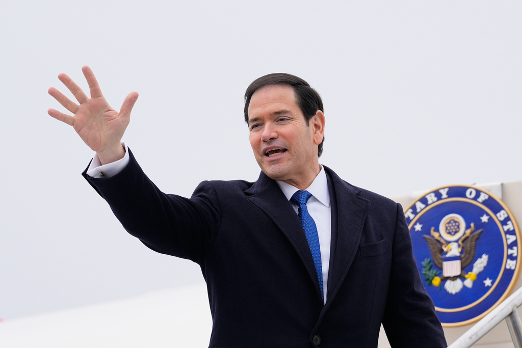 U.S. Secretary of State Marco Rubio waves as he departs at the Liszt Ferenc International Airport in Budapest, Hungary, Monday, Feb. 16, 2026. (AP Photo/Alex Brandon, Pool)