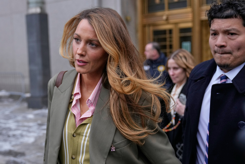 Blake Lively leaves a courthouse in New York, Wednesday, Feb. 11, 2026, who came to the courthouse to see if her lawsuit alleging sexual harassment on the set of the 2024 romantic drama “It Ends With Us” could be settled before a May trial. (AP Photo/Seth Wenig)