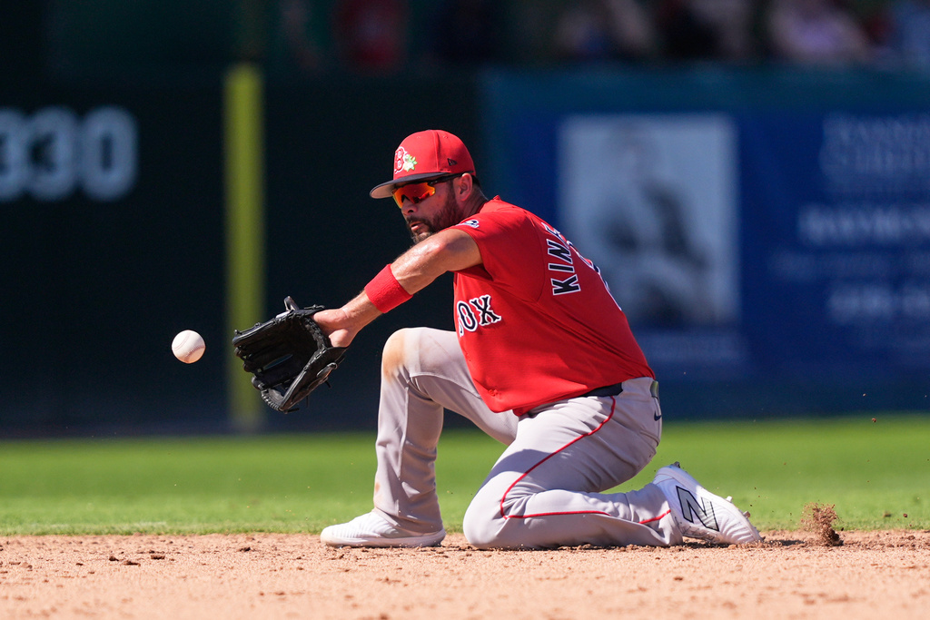 Boston Red Sox shortstop Isiah Kiner-Falefa fields a groundout by Minnesota Twins Eric Wagaman to end the fifth inning of a spring training baseball game in Fort Myers, Fla., Saturday, Feb. 21, 2026. (AP Photo/Gerald Herbert)