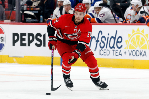 Carolina Hurricanes' Sebastian Aho (20) brings the puck up the ice against the New York Islanders during the second period of an NHL hockey game in Raleigh, N.C., Thursday, Oct. 30, 2025. (AP Photo/Karl DeBlaker) Carolina Hurricanes' Sebastian Aho (20) brings the puck up the ice against the New York Islanders during the second period of an NHL hockey game in Raleigh, N.C., Thursday, Oct. 30, 2025. (AP Photo/Karl DeBlaker)
