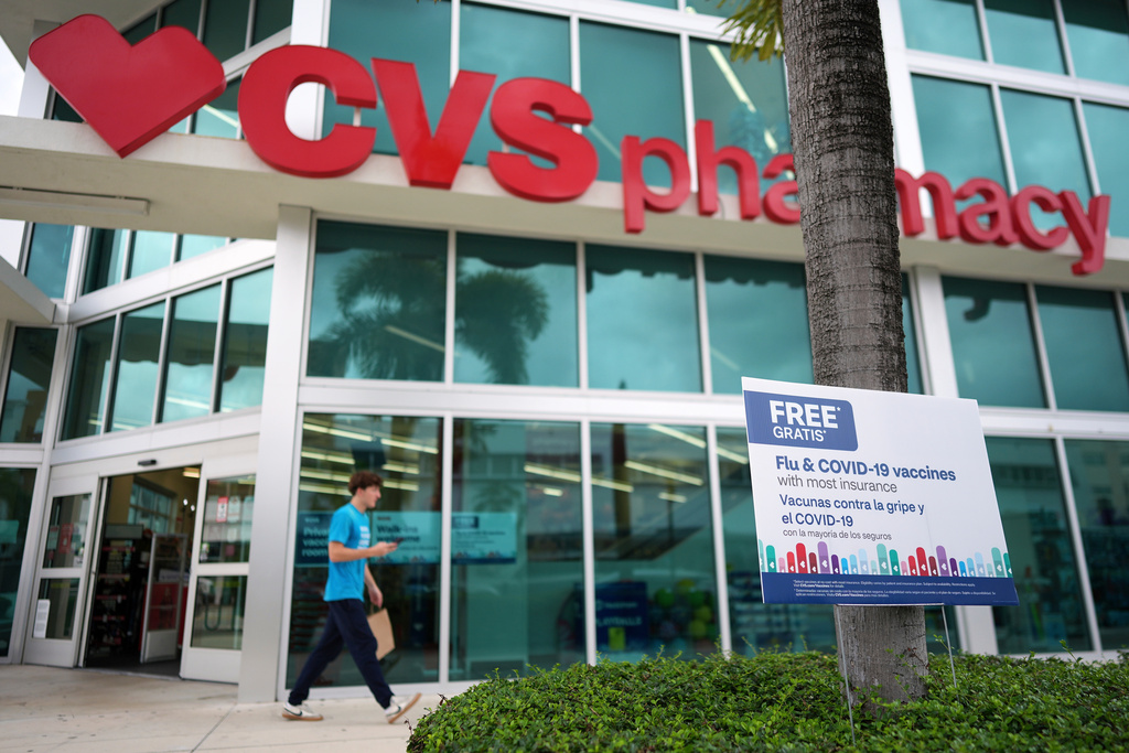 FILE - Vaccines are advertised outside a pharmacy in Miami, Thursday, Sept. 4, 2025. (AP Photo/Rebecca Blackwell, File)