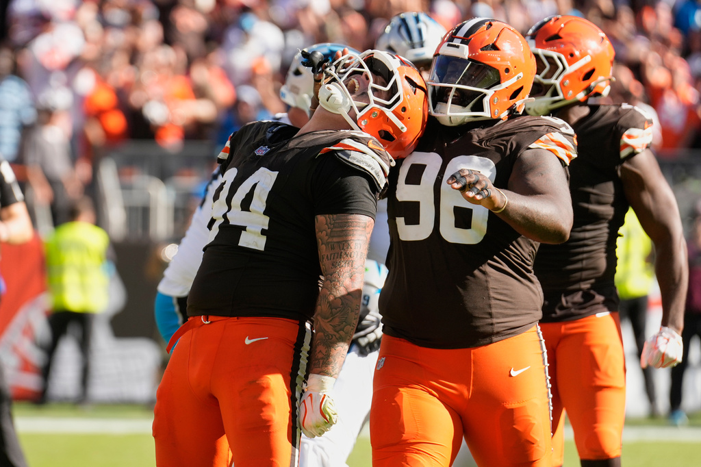 Cleveland Browns defensive tackle Mason Graham (94) celebrates after making a sack against the Carolina Panthers during the second half of an NFL football game in Cleveland, Thursday, Aug. 27, 2026. (AP Photo/Sue Ogrocki)