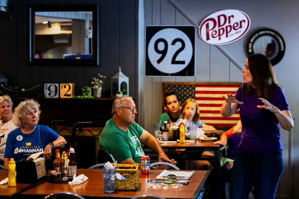 Christina Bohannan, Democratic candidate for U.S. House, speaks during a campaign event with the Louisa County Democrats, in Columbus Junction, Iowa, Sunday, Aug. 16, 2026. (AP Photo/Joseph Cress)