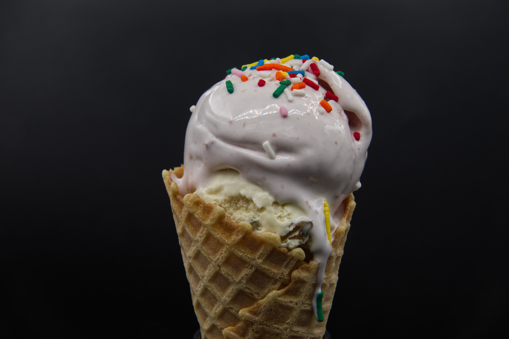 Ice cream on a waffle cone begins to melt as it is displayed in Phoenix, Wednesday, Aug. 19, 2026. (AP Photo/Dario Lopez-Mills)