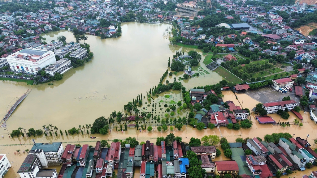 This aerial image shows flooding caused by rain following typhoon Bualoi in Lao Cai, Vietnam, Tuesday, Sept. 30, 2025. (Do Tuan Anh/VNA via AP)