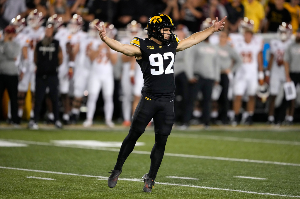 Iowa placekicker Caden Buhr celebrates after making a field goal during the second half of an NCAA college football game against Iowa State, Saturday, Sept. 12, 2026, in Iowa City, Iowa. (AP Photo/Charlie Neibergall)