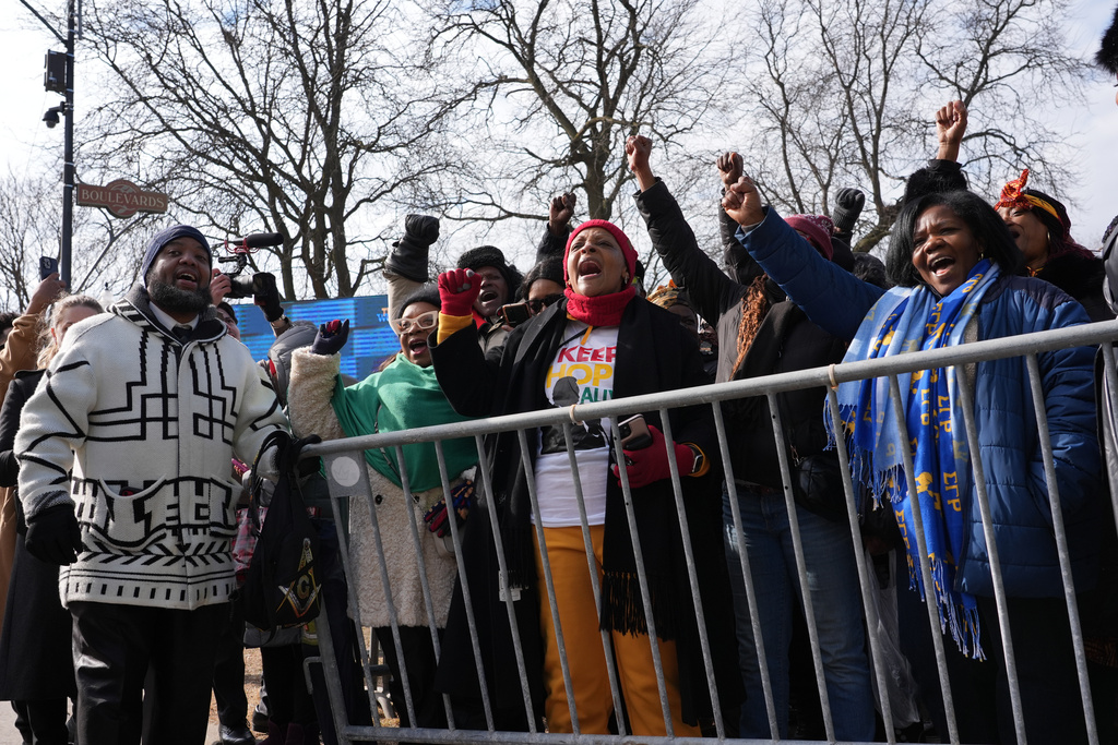 People wait to enter the security check point for the public visitation for Reverend Jesse Jackson at Rainbow/PUSH Coalition in Chicago, Thursday, Feb. 26, 2026. (AP Photo/Nam Y. Huh)