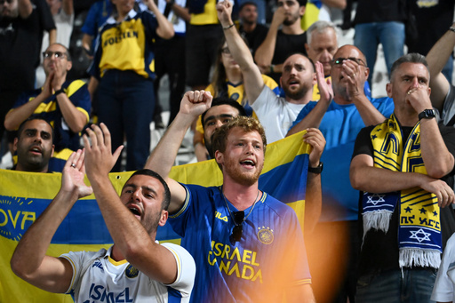 FILE -Maccabi Tel Aviv's fans clap hands after the end of the Europa League soccer match between PAOK and Maccabi Tel Aviv at Toumpa stadium, in Thessaloniki, Greece, Sept. 24, 2025. (AP Photo/Giannis Papanikos, File) FILE -Maccabi Tel Aviv's fans clap hands after the end of the Europa League soccer match between PAOK and Maccabi Tel Aviv at Toumpa stadium, in Thessaloniki, Greece, Sept. 24, 2025. (AP Photo/Giannis Papanikos, File)