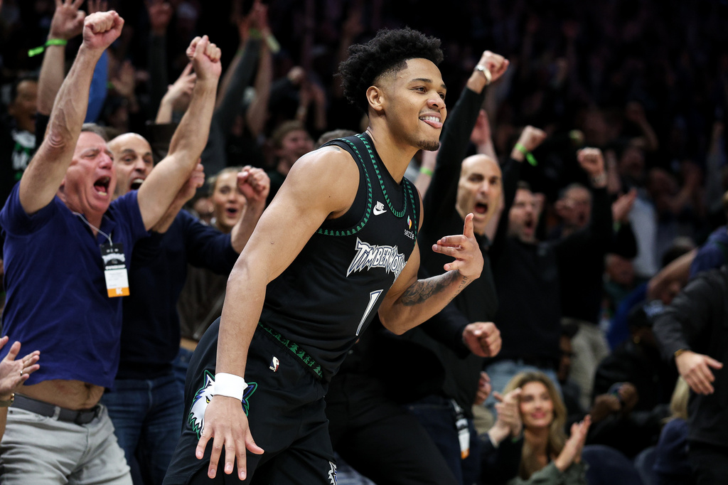 Minnesota Timberwolves guard Terrence Shannon Jr. (1) celebrates his three-point basket against the Denver Nuggets during the second half of Game 6 of a first-round NBA basketball playoffs series, Thursday, April 30, 2026, in Minneapolis. (AP Photo/Matt Krohn)