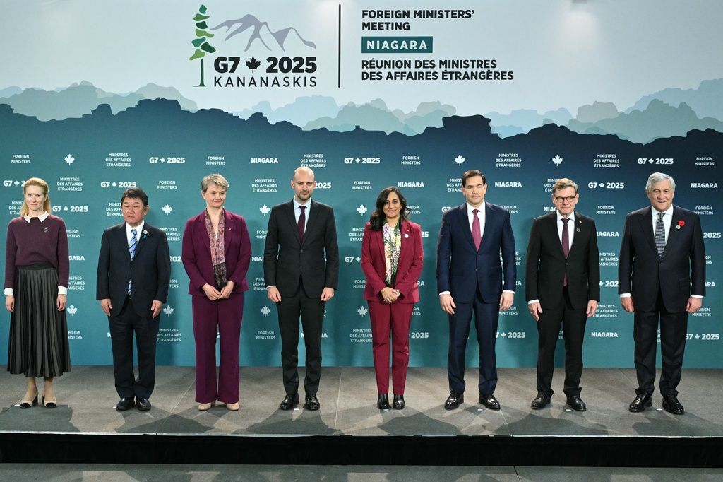 Foreign Ministers, from left, European Union's Kaja Kallas, Japan's Toshimitsu Motegi, Britain's Yvette Cooper, France's Jean-Noel Barrot, Canada's Anita Anand, U.S. Secretary of State Marco Rubio, Germany's Johann Wadephul and Italy's Antonio Tajani pose for the family photo during the G7 Foreign Ministers' meeting at the White Oaks Resort in Niagara-on-the-Lake, Ontario, Canada, Tuesday, Nov. 11, 2025. (Mandel Ngan/Pool Photo via AP)