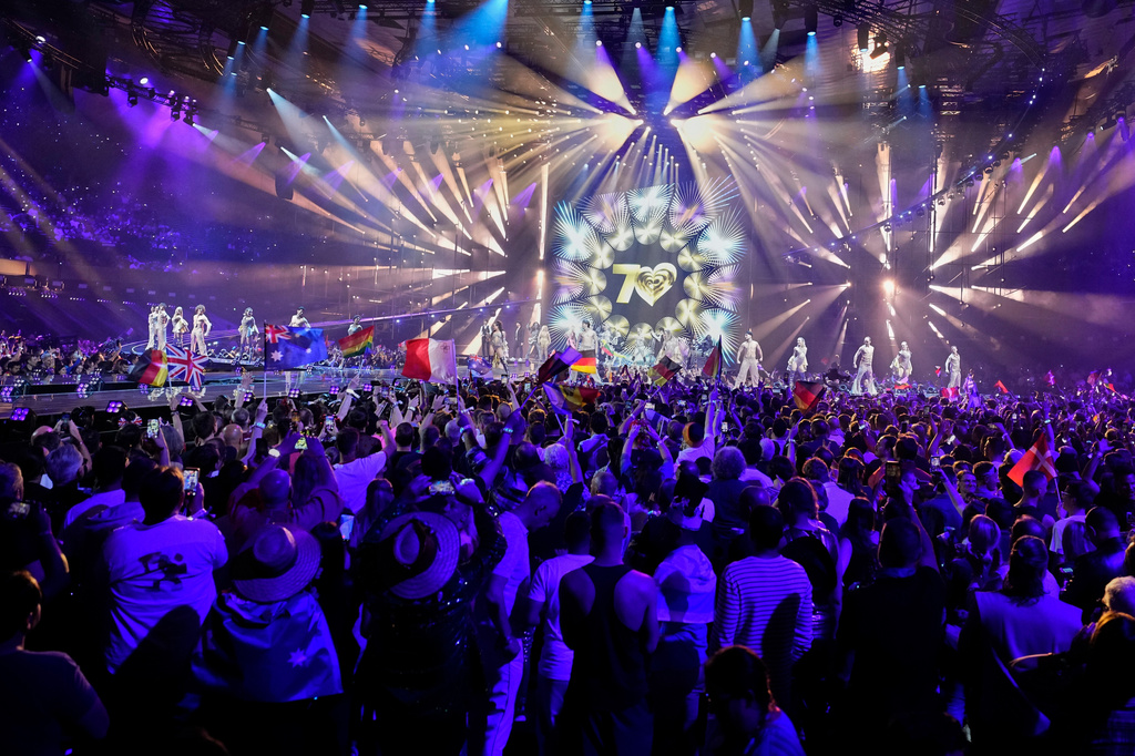 Performers on stage as voting results are collected during the Grand Final of the 70th Eurovision Song Contest in Vienna, Austria, Saturday, May 16, 2026. (AP Photo/Martin Meissner)