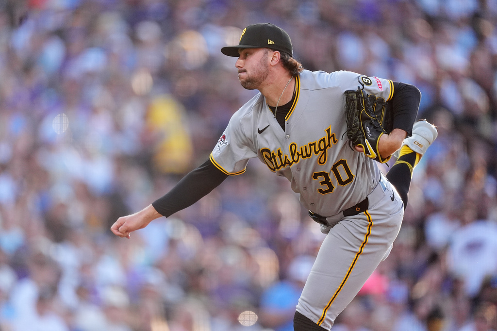 Pittsburgh Pirates starting pitcher Paul Skenes works against the Colorado Rockies in the first inning of a baseball game Saturday, June 20, 2026, in Denver. (AP Photo/David Zalubowski)