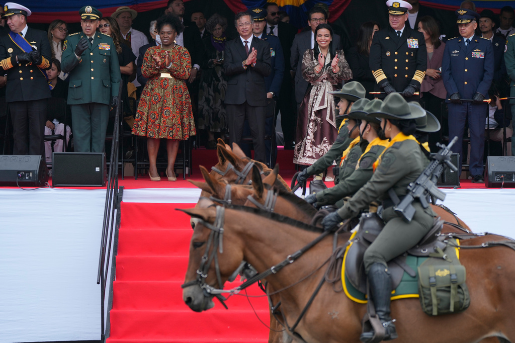 President Gustavo Petro, center, and Vice President Francia Marquez, third from left, attend a military parade marking Colombia's Independence Day in Bogota, Colombia, Monday, July 20, 2026. (AP Photo/Fernando Vergara)