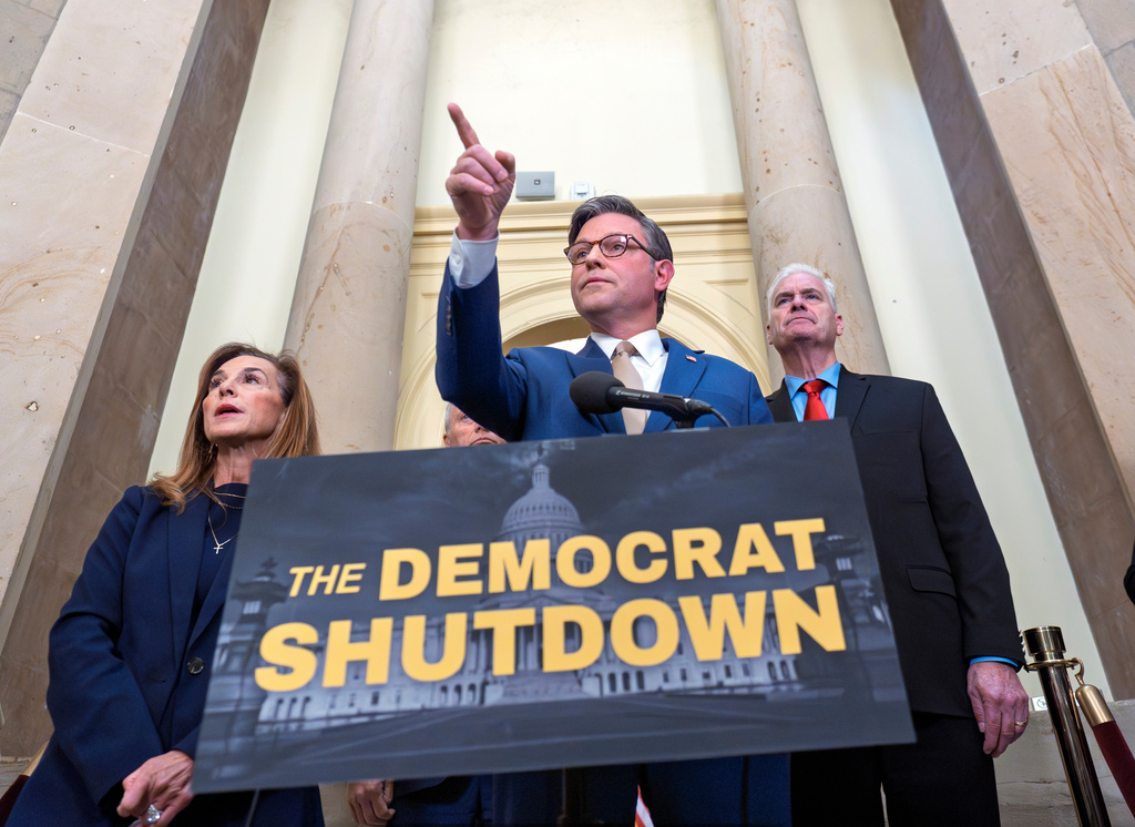 FILE - Speaker of the House Mike Johnson, R-La., and GOP leaders, from left, Rep. Lisa McClain, R-Mich., and Majority Whip Tom Emmer, R-Minn., blame the government shutdown on Democrats during a news conference at the Capitol in Washington, Oct. 2, 2025. (AP Photo/J. Scott Applewhite, File)