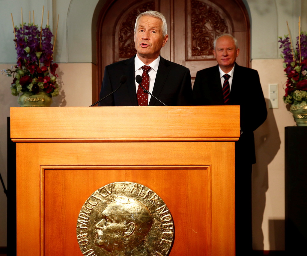 FILE - Chairman of the Norwegian Nobel Committee Thorbjorn Jagland announces the winner of the Nobel Peace Prize, at the Nobel Institute in Oslo, Friday Oct. 11, 2013. (Heiko Junge/NTB Scanpix via AP, File)
