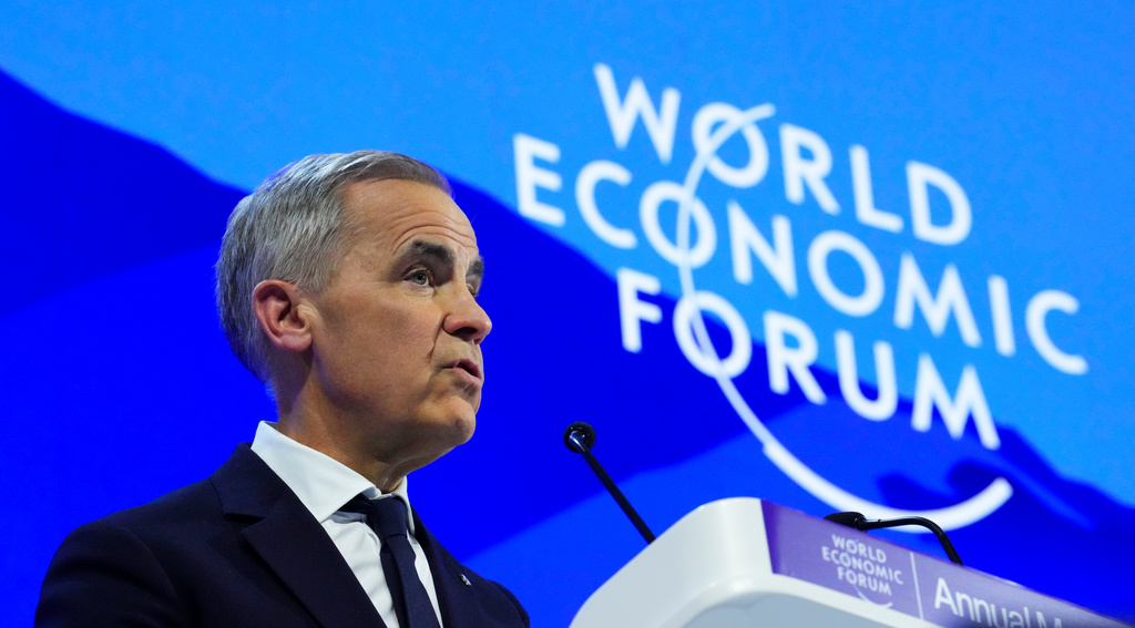 Canada Prime Minister Mark Carney delivers a speech at the World Economic Forum in Davos, Switzerland on Tuesday, Jan. 20, 2026. (Sean Kilpatrick/The Canadian Press via AP)