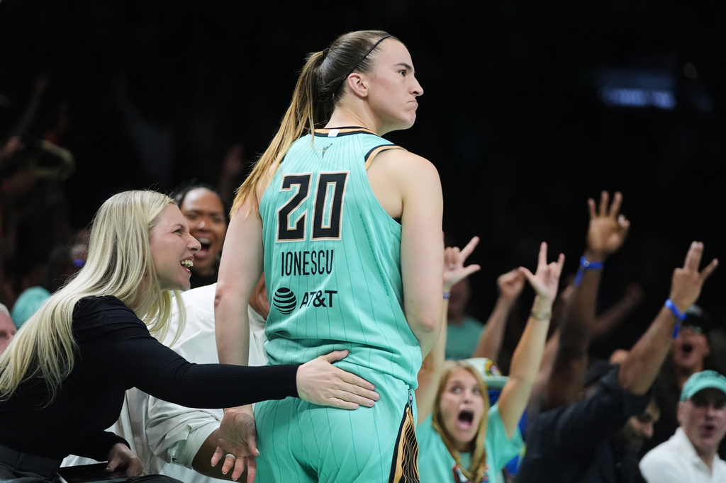 New York Liberty's Sabrina Ionescu (20) reacts after making a three-point shot during the second half of a WNBA basketball game against the Chicago Sky Wednesday, July 22, 2026, in New York. (AP Photo/Frank Franklin II)