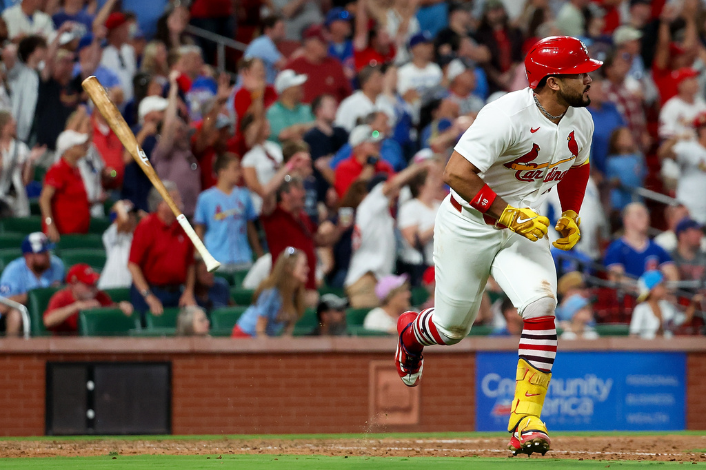 St. Louis Cardinals' Iván Herrera watches the ball as he runs for a two RBI walk-off double during the tenth inning of a baseball game against the Chicago Cubs, Wednesday, July 29, 2026, in St. Louis. (AP Photo/Scott Kane)