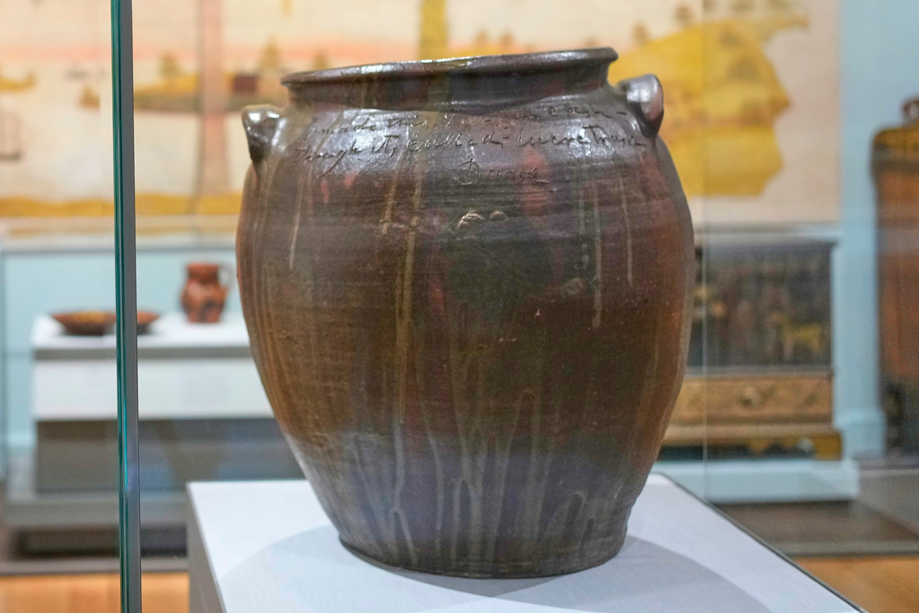 A stoneware vessel created by enslaved potter David Drake is seen at the Museum of Fine Arts, Monday, Nov. 10, 2025, in Boston. (AP Photo/Robert F. Bukaty)