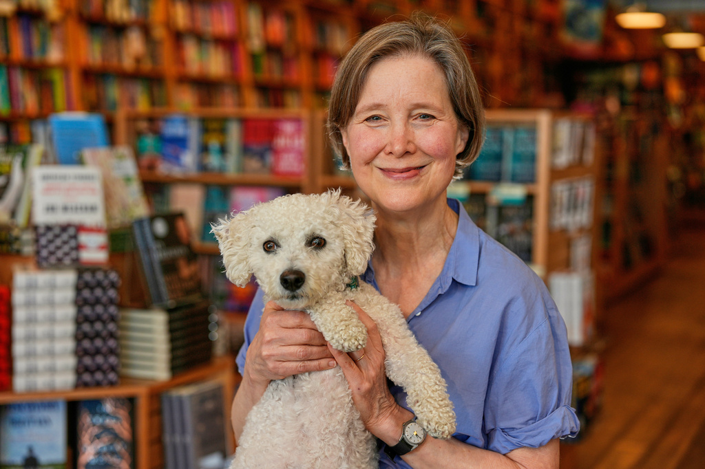 Author Ann Patchett poses for a portrait with Nemo, her 3-year-old bichon-poodle, at her bookstore in Nashville, Tenn., on April 22, 2026. (AP Photo/George Walker IV)