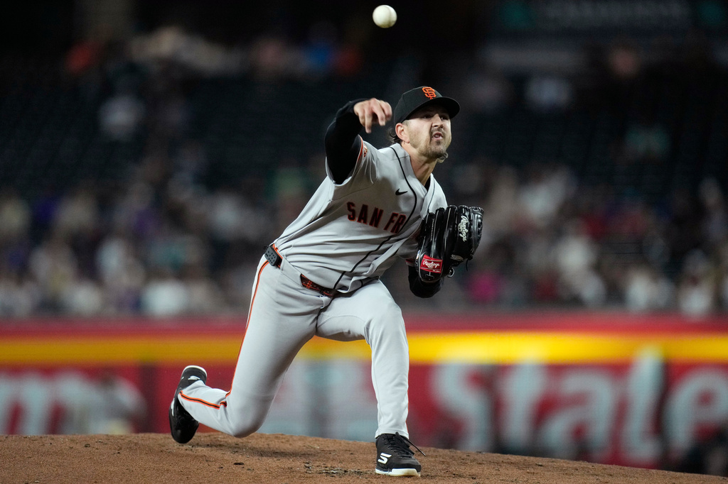 San Francisco Giants starting pitcher Tyler Mahle throws against the Arizona Diamondbacks during the first inning of a baseball game, Monday, June 29, 2026, in Phoenix. (AP Photo/Ross D. Franklin)