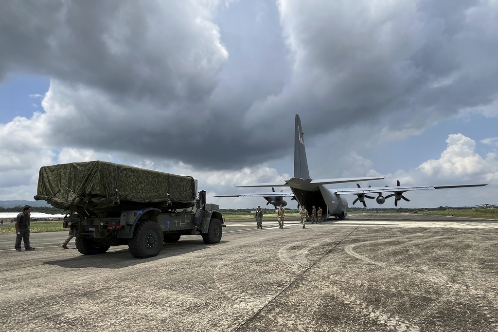 FILE - A part of a US Navy-Marine Expeditionary Ship Interdiction System (NMESIS) is loaded of a US C130 military plane at Lal-lo, Cagayan International Airport, northern Philippines as part of Philippines US joint military drills called "Balikatan" or "shoulder to shoulder" on Saturday April 26, 2025. (AP Photo/Jim Gomez,File)