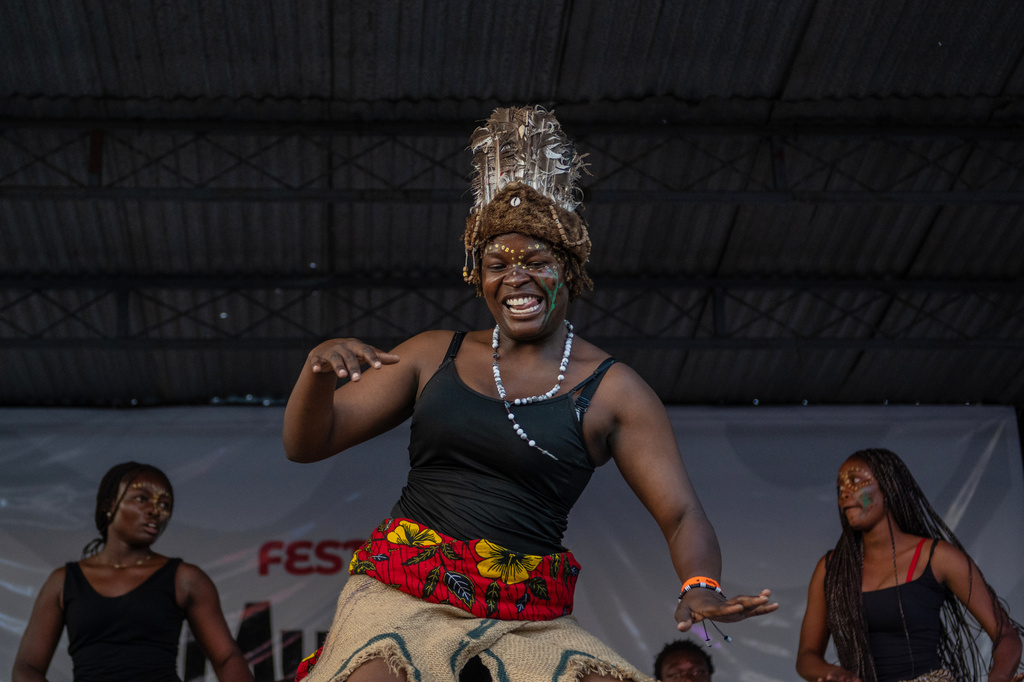 A dancer performs on stage during rapper Clem Cleopatre's concert in Goma, Democratic Republic of Congo, Sunday, March 29, 2026. (AP Photo/Moses Sawasawa)