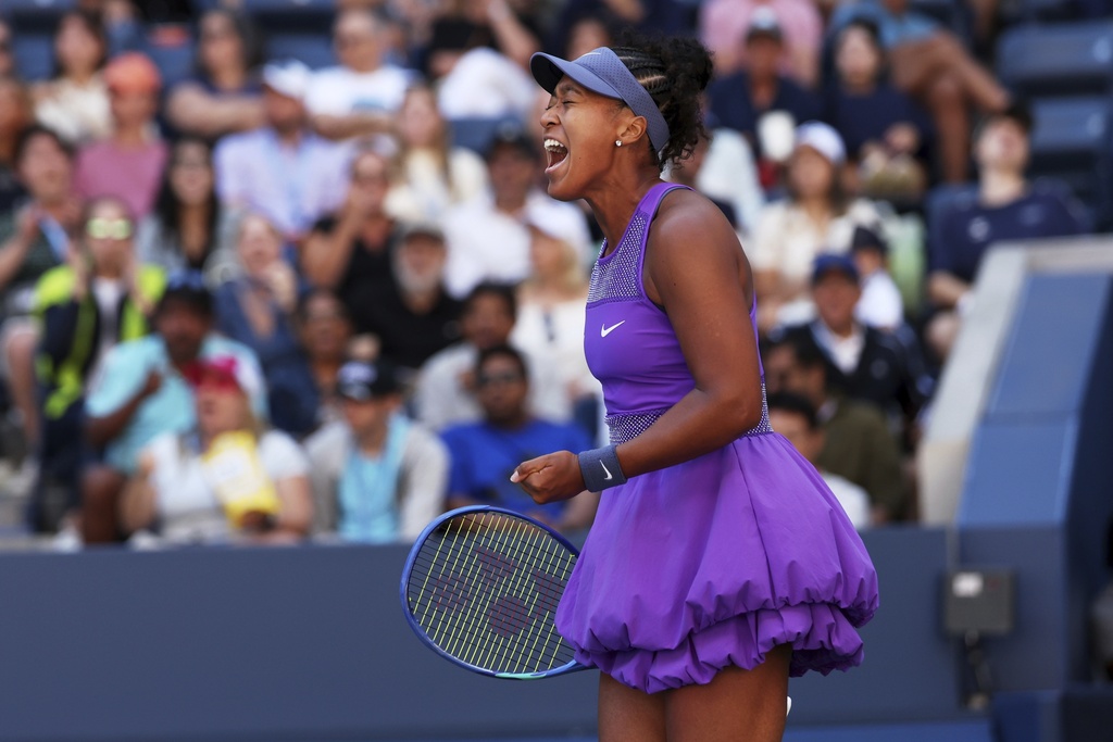 Naomi Osaka, of Japan, reacts to a point against Daria Kasatkina, of Australia, during the third round of the U.S. Open tennis championships, Saturday, Aug. 30, 2025, in New York. (AP Photo/Heather Khalifa)