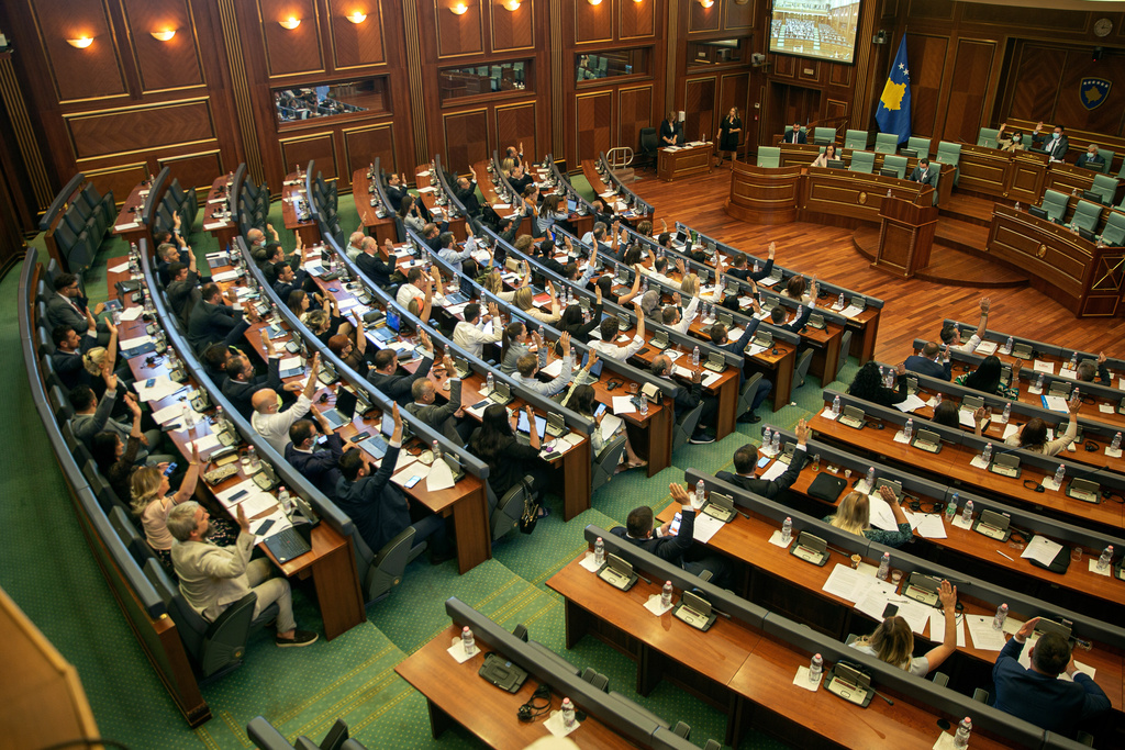 FILE - Kosovo lawmakers during a parliament session in Pristina, Kosovo on Wednesday, July 7, 2021. (AP Photo/Visar Kryeziu, File)
