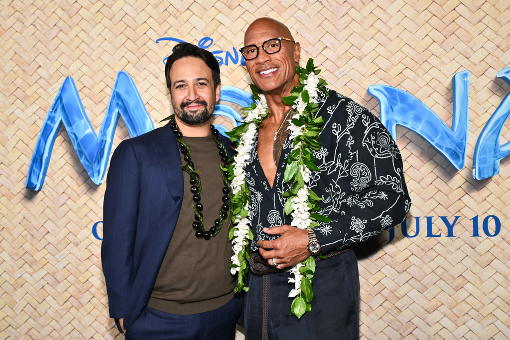 Lin-Manuel Miranda, left, and Dwayne Johnson arrive at a special screening of Disney's "Moana" at the United Palace on Thursday, July 9, 2026, in New York. (Photo by Evan Agostini/Invision/AP)
