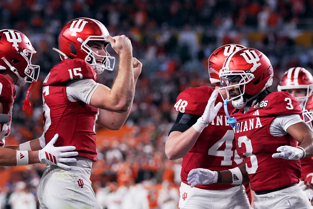 Indiana quarterback Fernando Mendoza celebrates after scoring against Miami during the second half of the College Football Playoff national championship game, Monday, Jan. 19, 2026, in Miami Gardens, Fla. (AP Photo/Marta Lavandier)