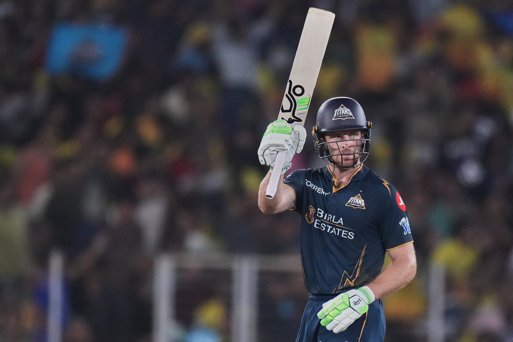 Gujarat Titans' Jos Buttler celebrates his fifty runs during the Indian Premier League cricket match between Gujarat Titans and Chennai Super Kings in Ahmedabad, India, Thursday, May 21, 2026.(AP Photo/Ajit Solanki)