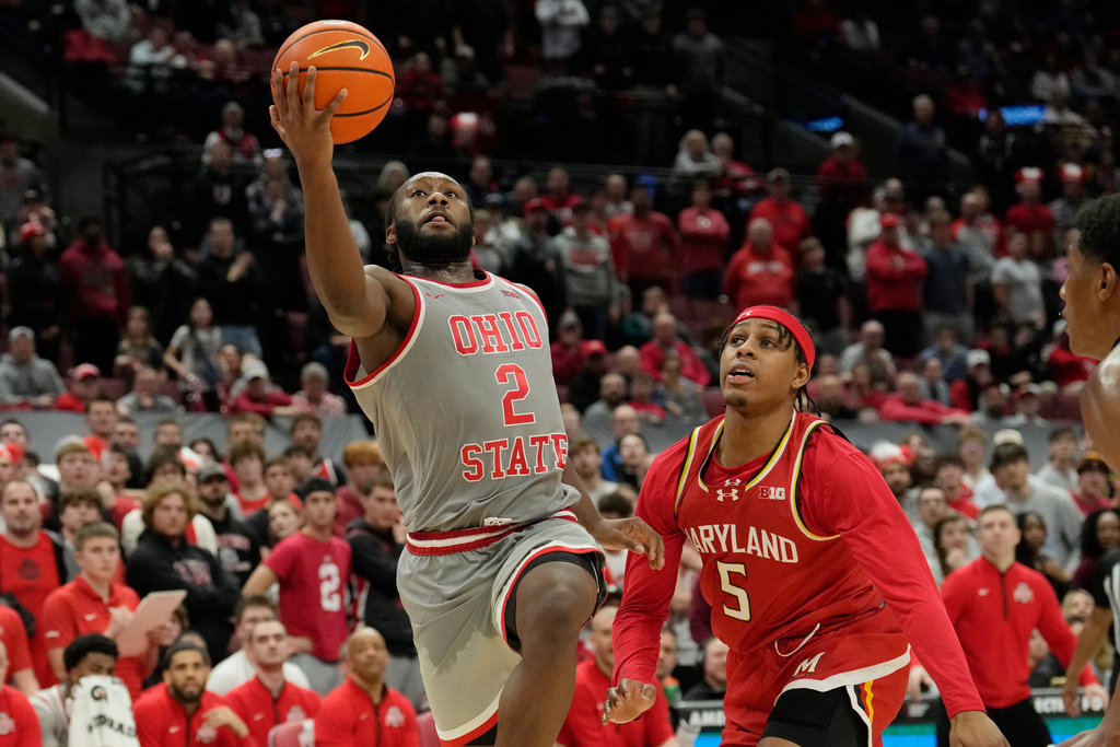 FILE - Ohio State guard Bruce Thornton (2) goes to the basket past Maryland guard DeShawn Harris-Smith (5) during the second half of an NCAA college basketball game Feb. 6, 2025, in Columbus, Ohio. (AP Photo/Sue Ogrocki, File)
