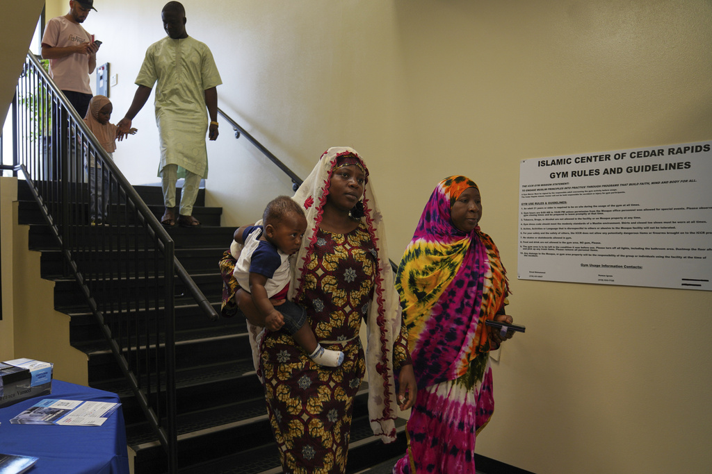 Families attend Friday prayer at the Islamic Center of Cedar Rapids on Friday, Aug. 8, 2025, in Cedar Rapids, Iowa. (AP Photo/Jessie Wardarski)