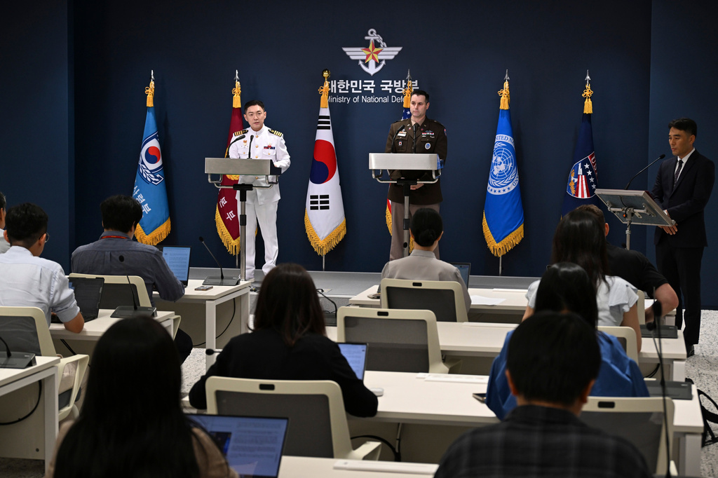 Col. Jang Do-young, center left, public affairs director of South Korea's Joint Chiefs of Staff, and Col. Ryan Donaldn, center right, public affairs director of the United Nations Command, Combined Forces Command and United States Forces Korea a press briefing for the Ulchi Freedom Shield 2026 exercise at the Defense Ministry in Seoul, South Korea Monday, Aug. 10, 2026. (Song Kyung-Seok/Pool Photo via AP)