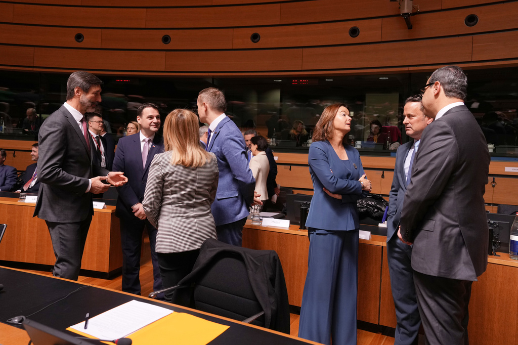 Slovenia's Foreign Minister Tanja Fajon, third right, speaks with Cypriot Foreign Minister Constantinos Kombos, right, and Luxembourg's Foreign Minister Xavier Bettel, second right, during a meeting of EU foreign ministers at the European Council building in Luxembourg, Tuesday, April 21, 2026. (AP Photo/Virginia Mayo)