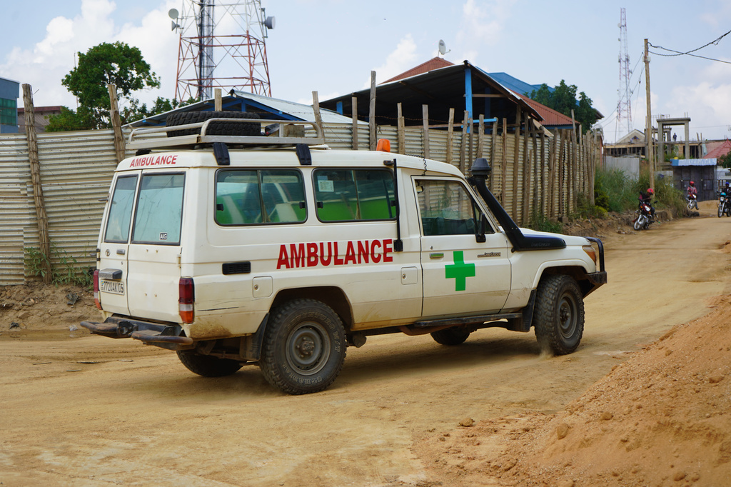 An ambulance drives past an ebola treatment centre in Bunia, Congo, Monday, July 20, 2026. (AP Photo/Prosper Heri Ngorora)