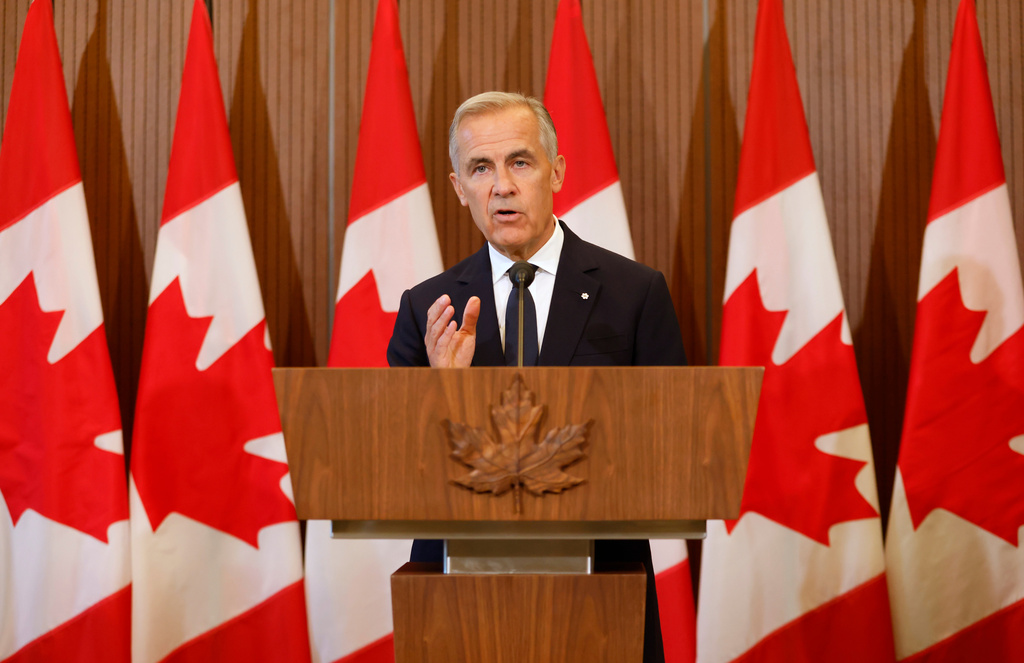 Prime Minister Mark Carney speaks about Canada's response to new U.S. tariffs during a news conference on Parliament Hill in Ottawa on Saturday, Aug. 22, 2026. (Patrick Doyle/The Canadian Press via AP)