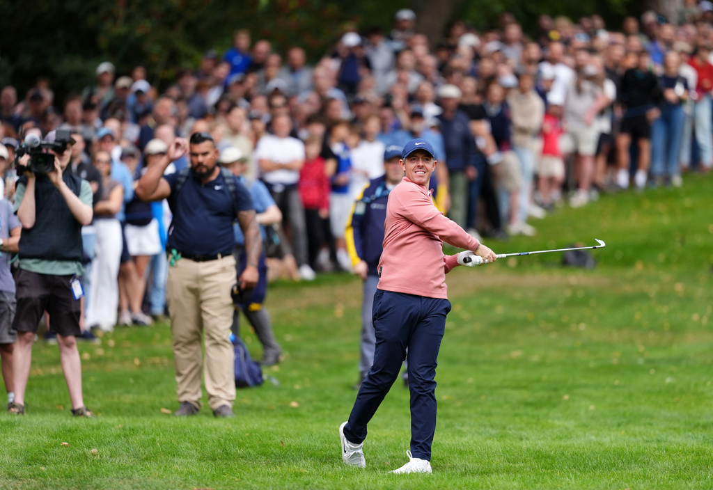 Rory McIlroy of Northern Ireland plays from the 4th fairway on day three of the PGA Championship at Wentworth Golf Club in Virginia Water, England, Saturday Sept. 19, 2026. (Adam Davy/PA via AP)